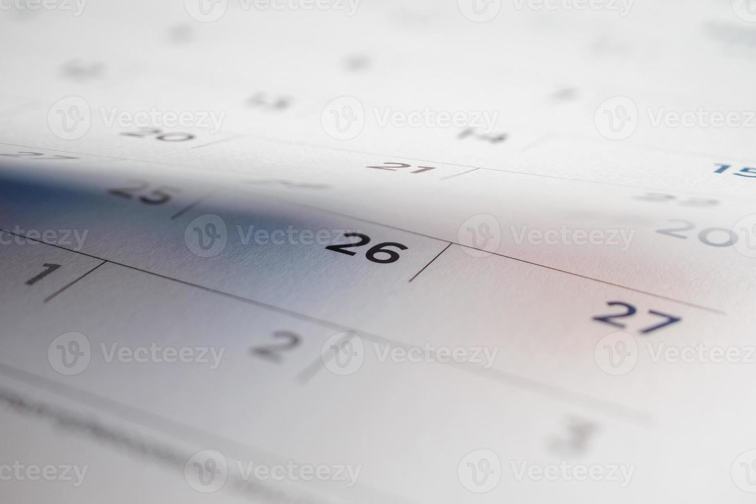 calendar page flipping sheet close up background photo