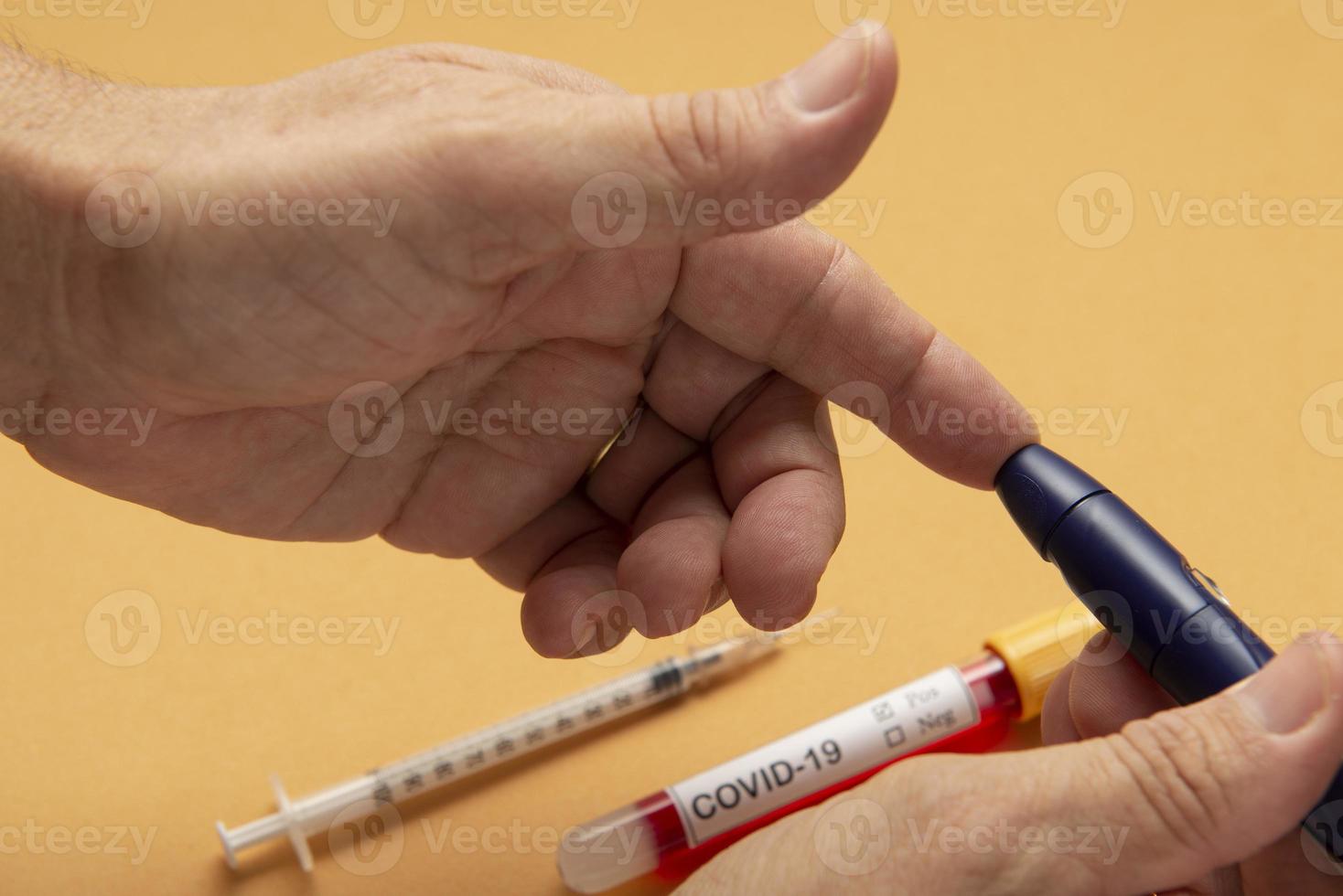 person doing fingertip test for blood glucose, 12573513 Stock Photo at