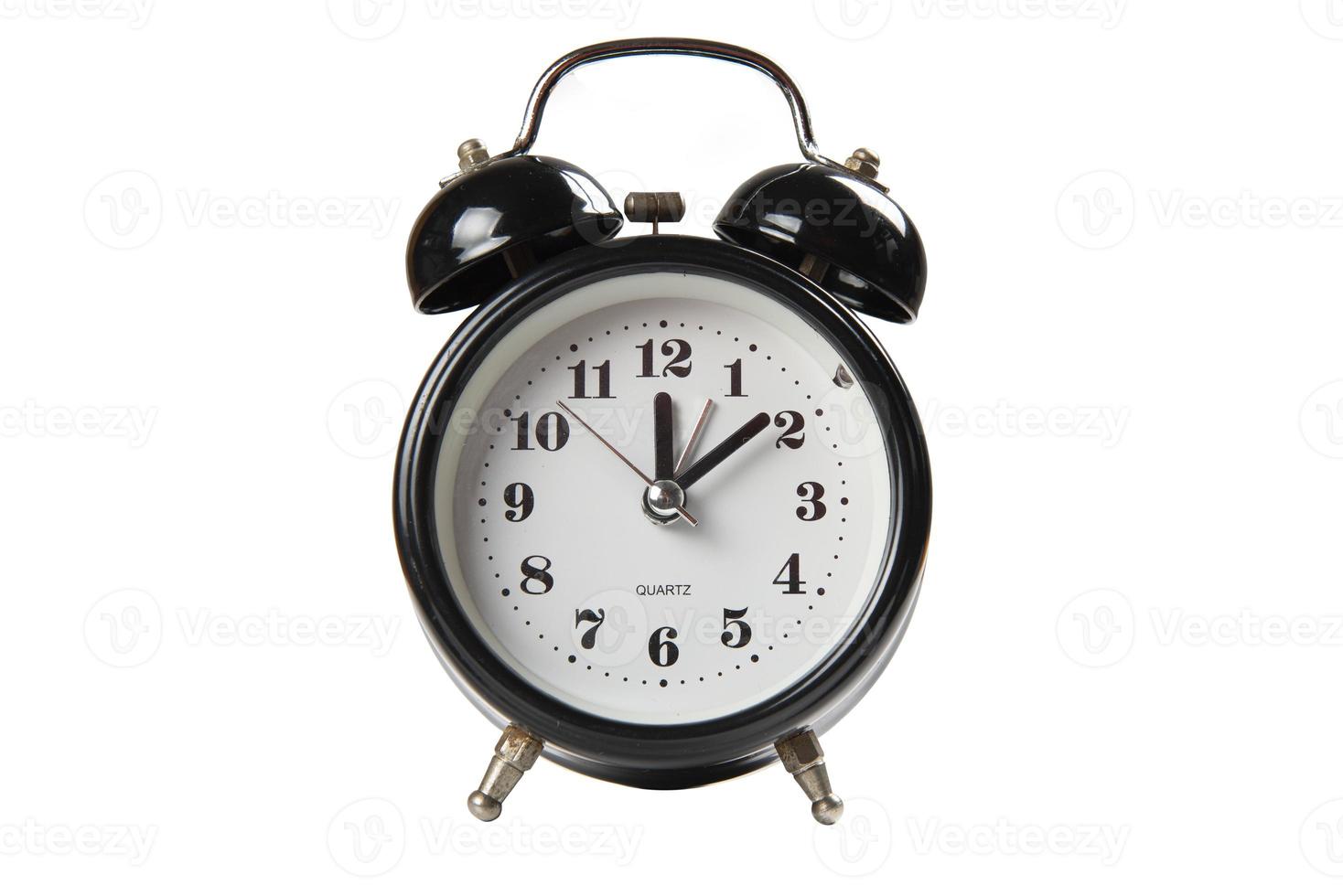 Black alarm clock isolated on white background photo