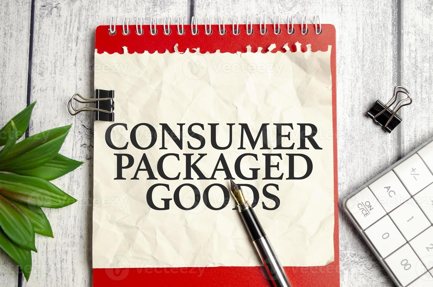 Text CPG - Consumer Packaged Goods text written on red notepad photo