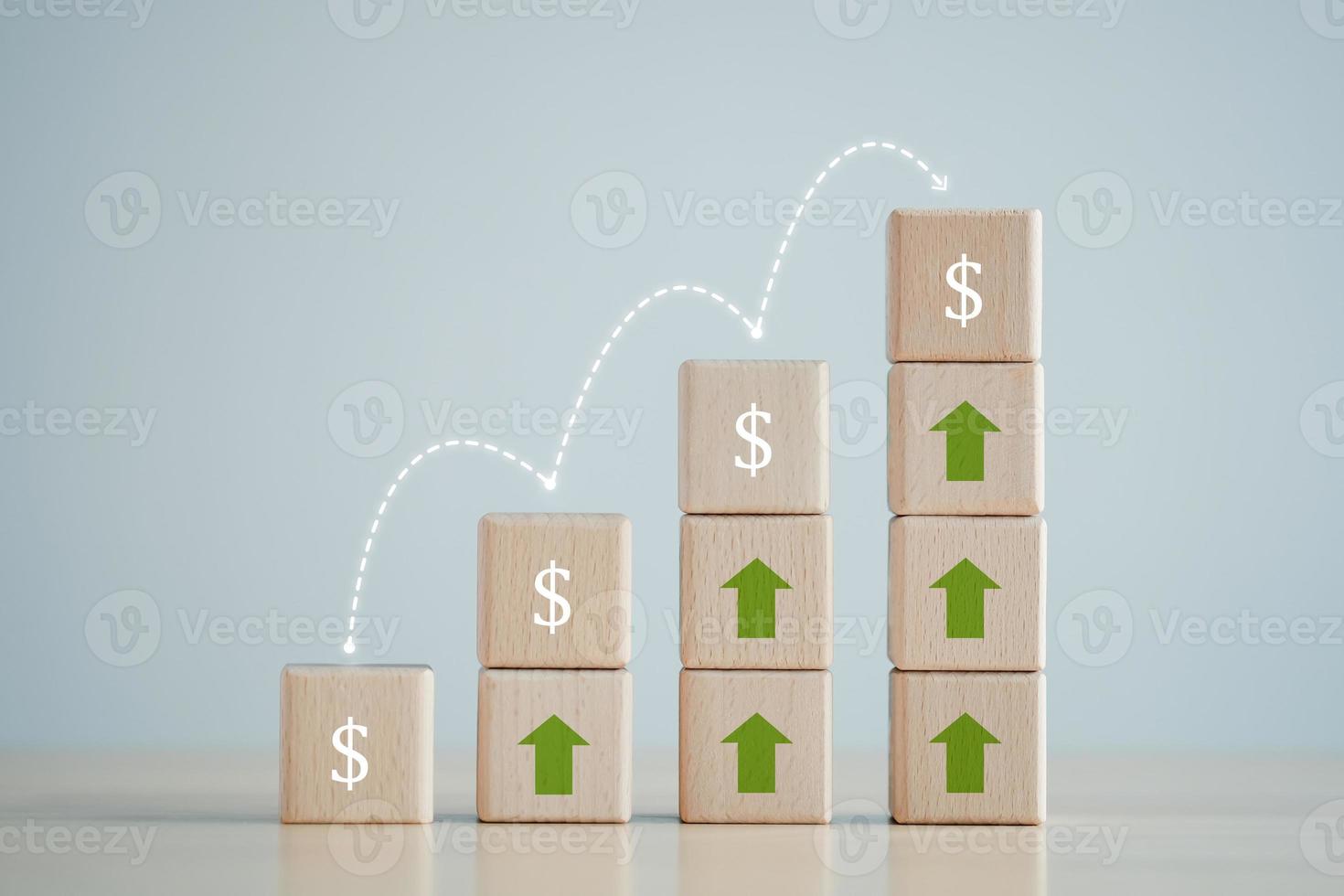 Business Success, investment, financial growth, profit, income, interest rate, inflation, Retirement and Saving money concept. Increase of dollar sign on stack of wooden block with rise of arrow. photo