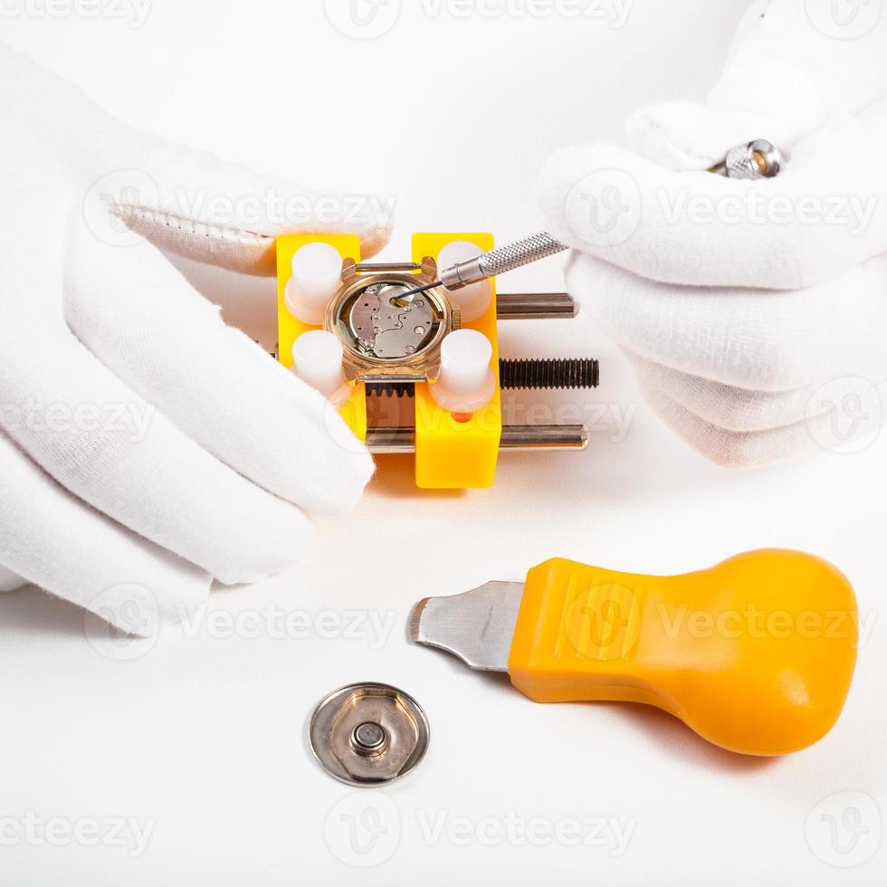 cleaning battery place in quartz watch photo