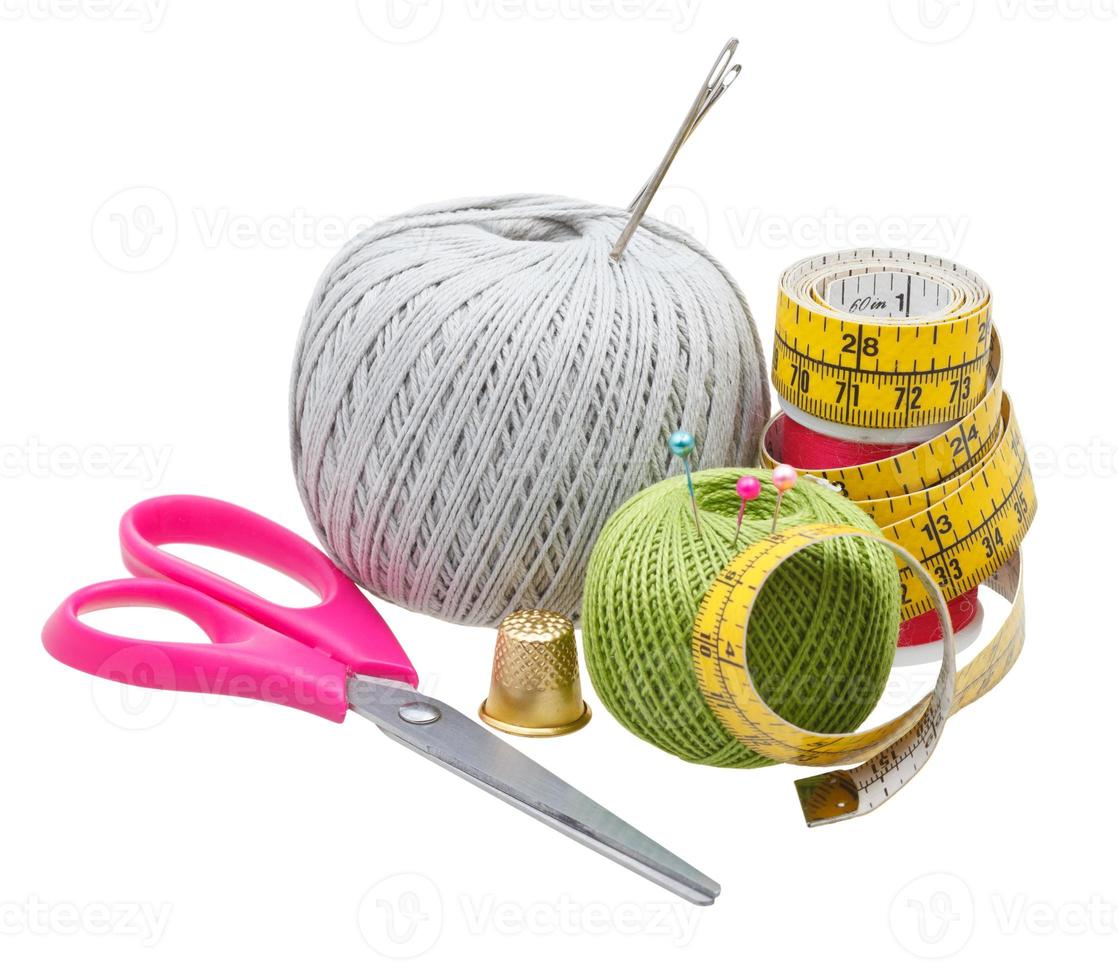 several sewing items isolated on white photo