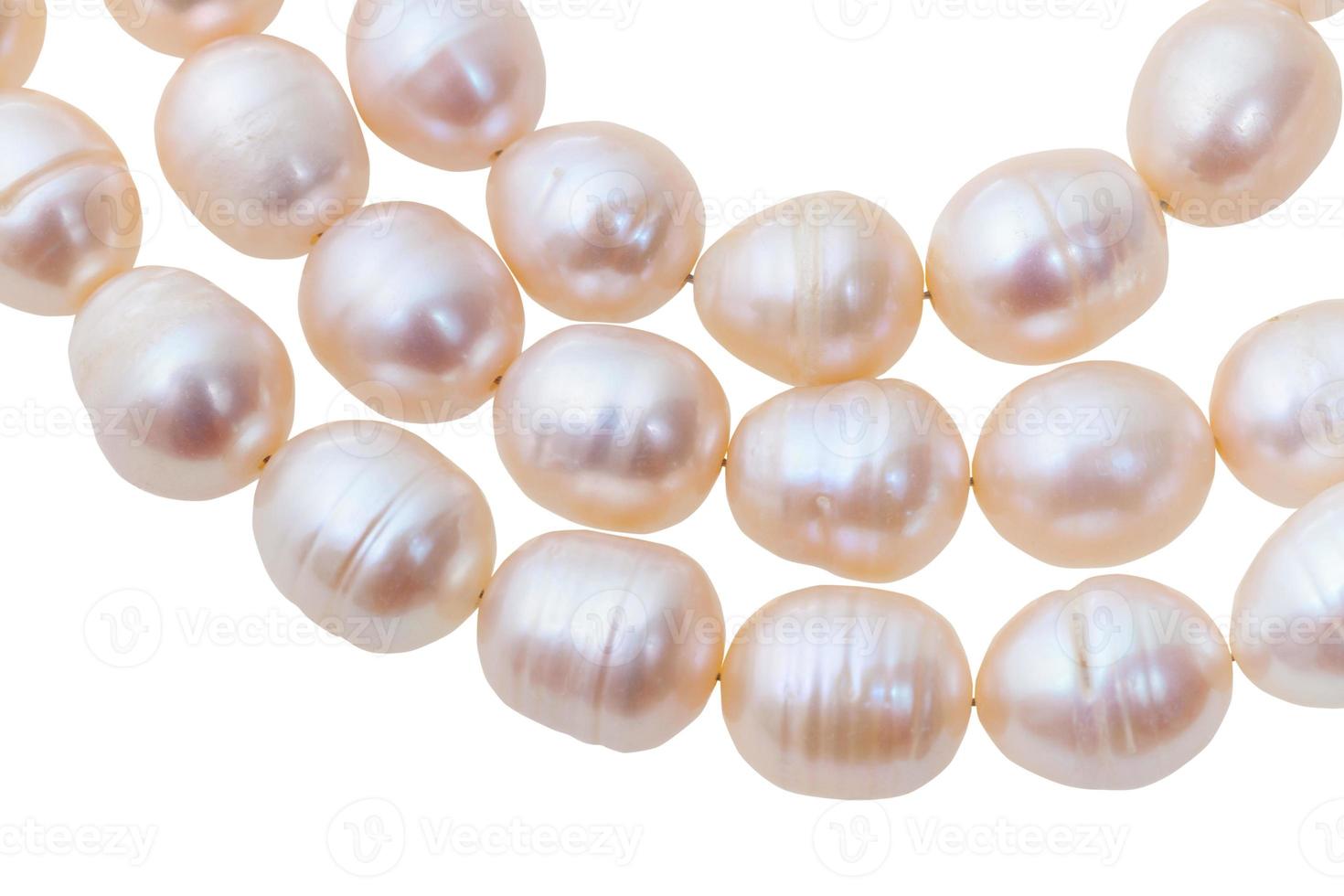 three strings of beads from pink river pearls photo