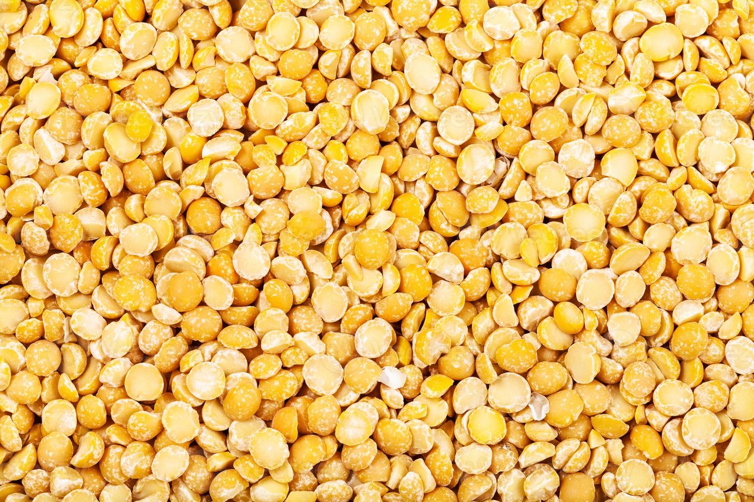 many raw yellow split peas photo