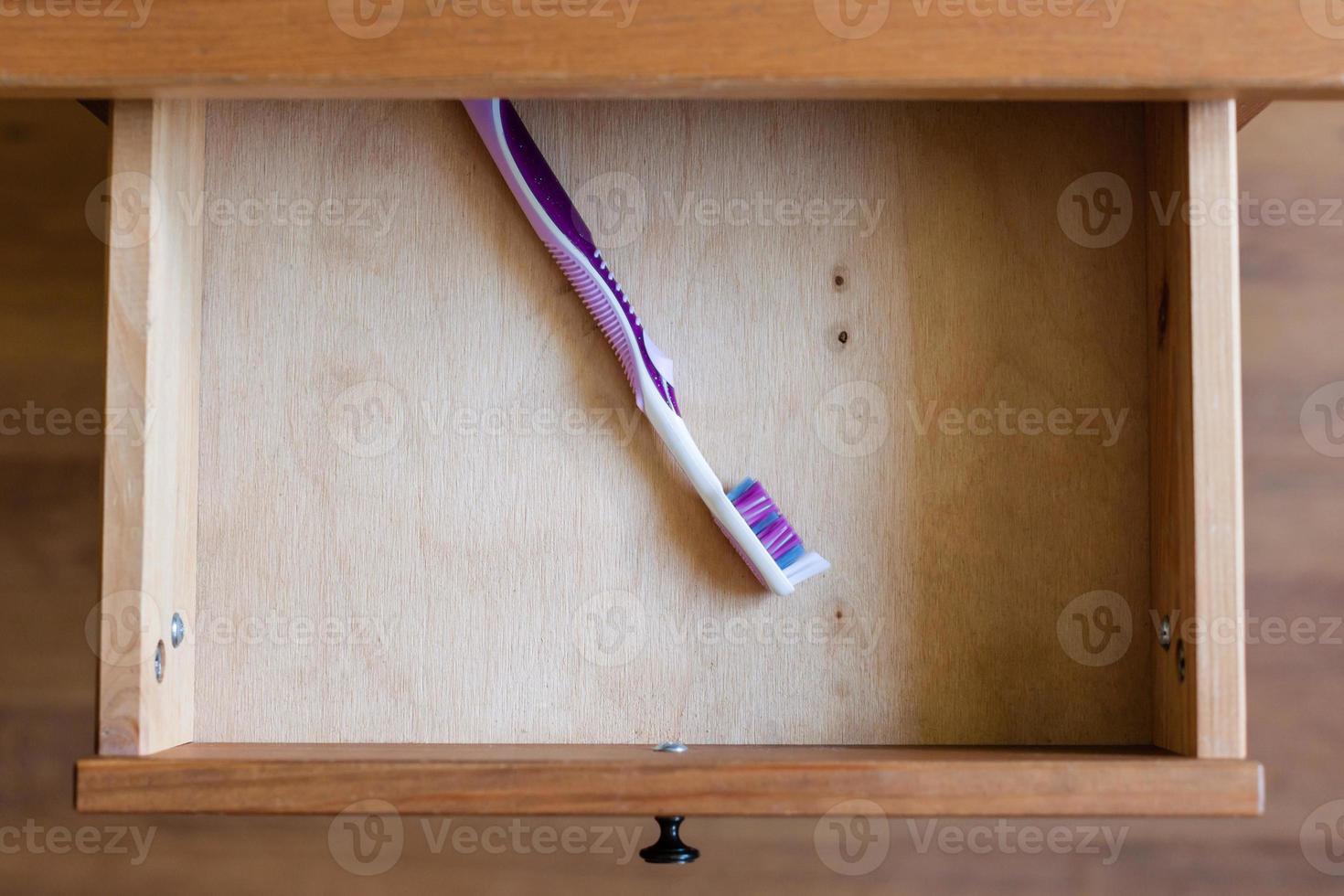 modern toothbrush in open drawer 12575744 Stock Photo at Vecteezy