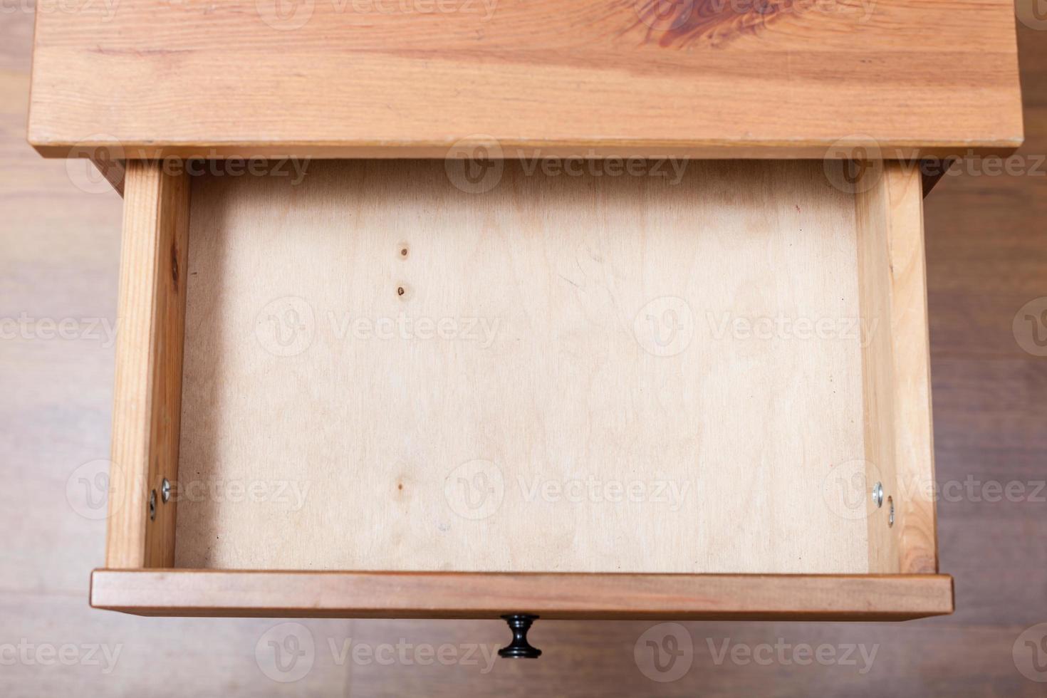 top view of empty open drawer photo