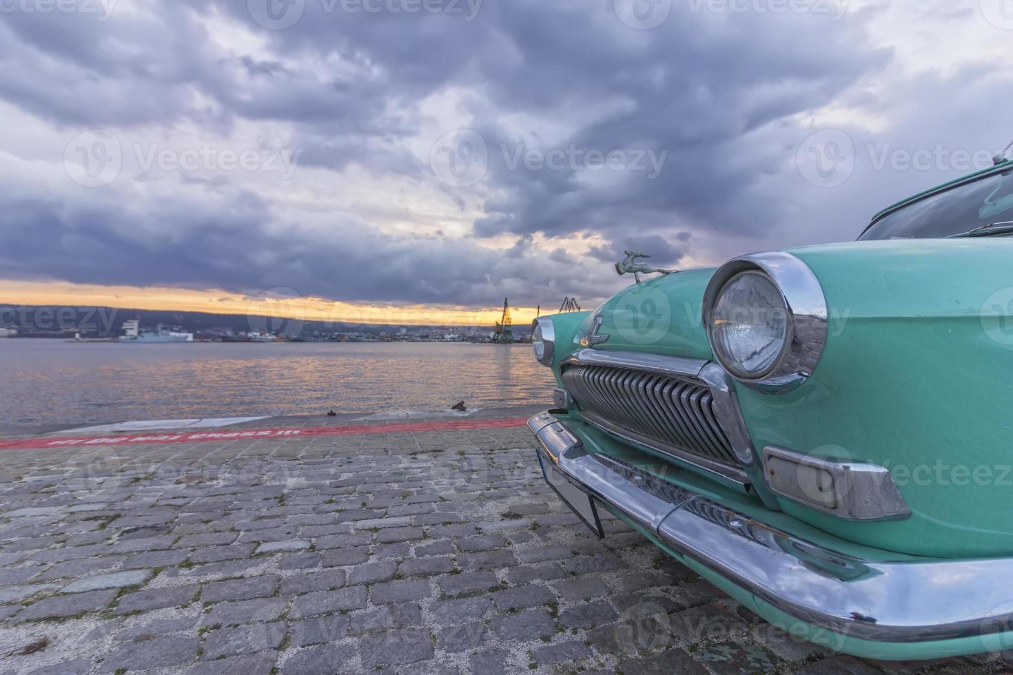 Varna, Bulgaria . Soviet retro car GAZ-21 Volga on the shores of Port photo