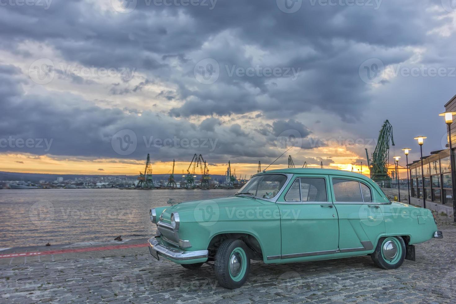 Varna, Bulgaria. Soviet retro car GAZ-21 Volga on the shores of Port photo