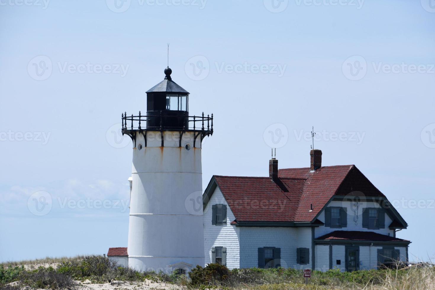Lighthouse and Keepers House on Cape Cod photo