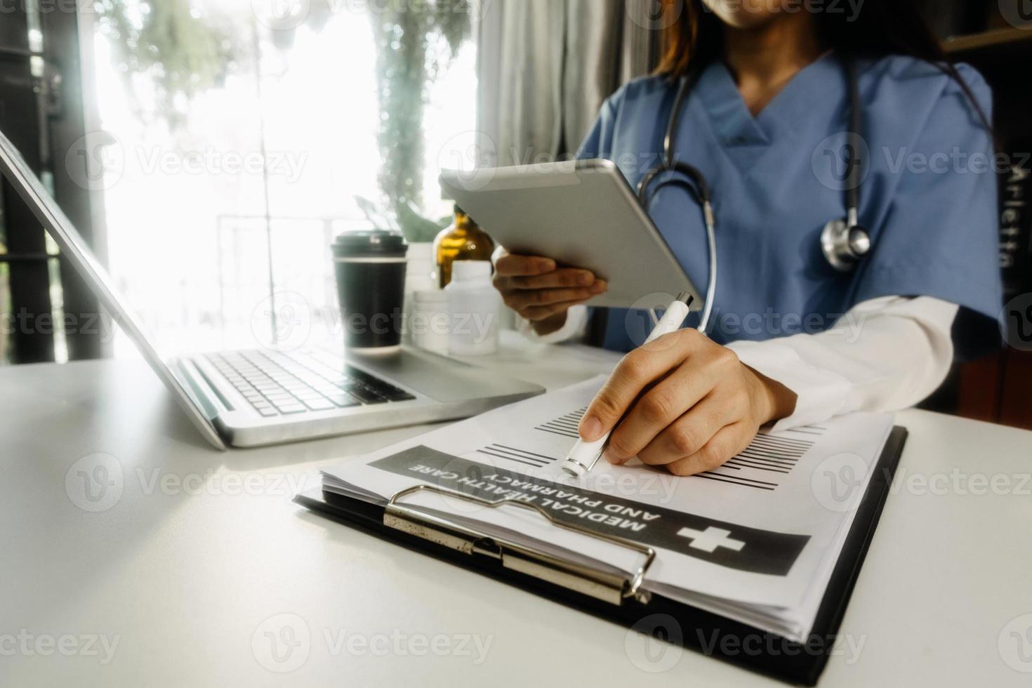 Doctor work on digital tablet healthcare doctor technology tablet using computer. photo