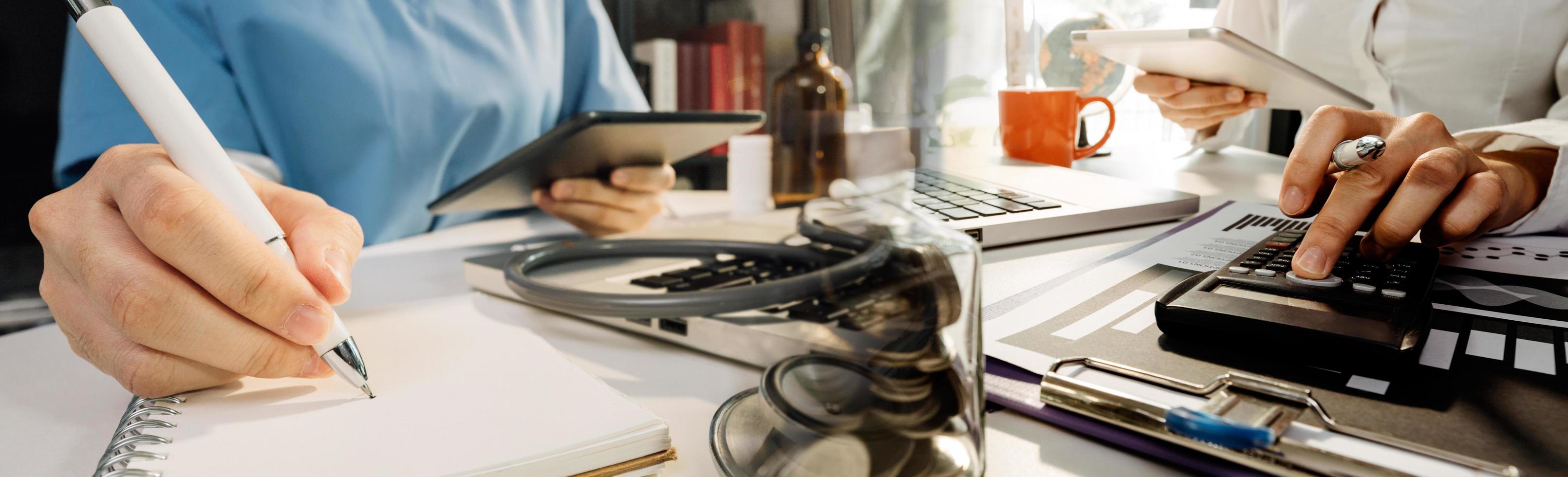 Medicine doctor hand working on a patients x-ray scans digital healthcare and connection with modern virtual screen interface icons, Medical technology and network concept. photo