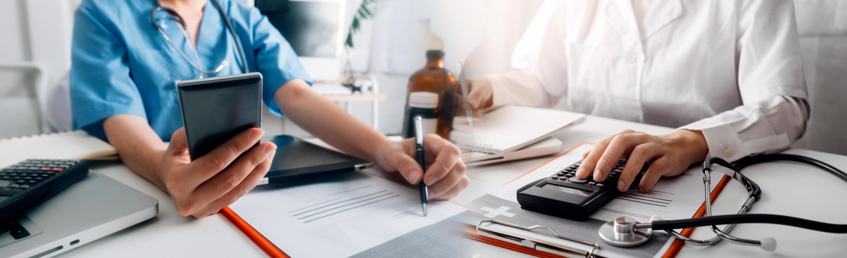 Medicine doctor hand working on a patients x-ray scans digital healthcare and connection with modern virtual screen interface icons, Medical technology and network concept. photo