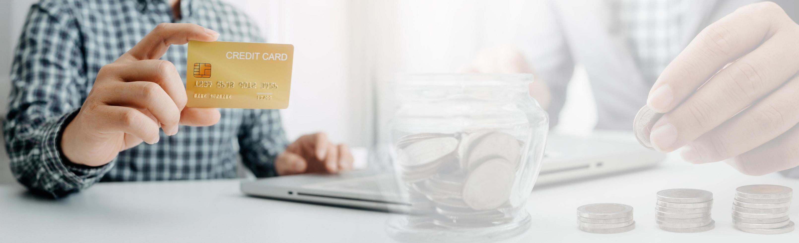 technology, people and online shopping concept - happy smiling man with tablet pc computer and credit card at home photo