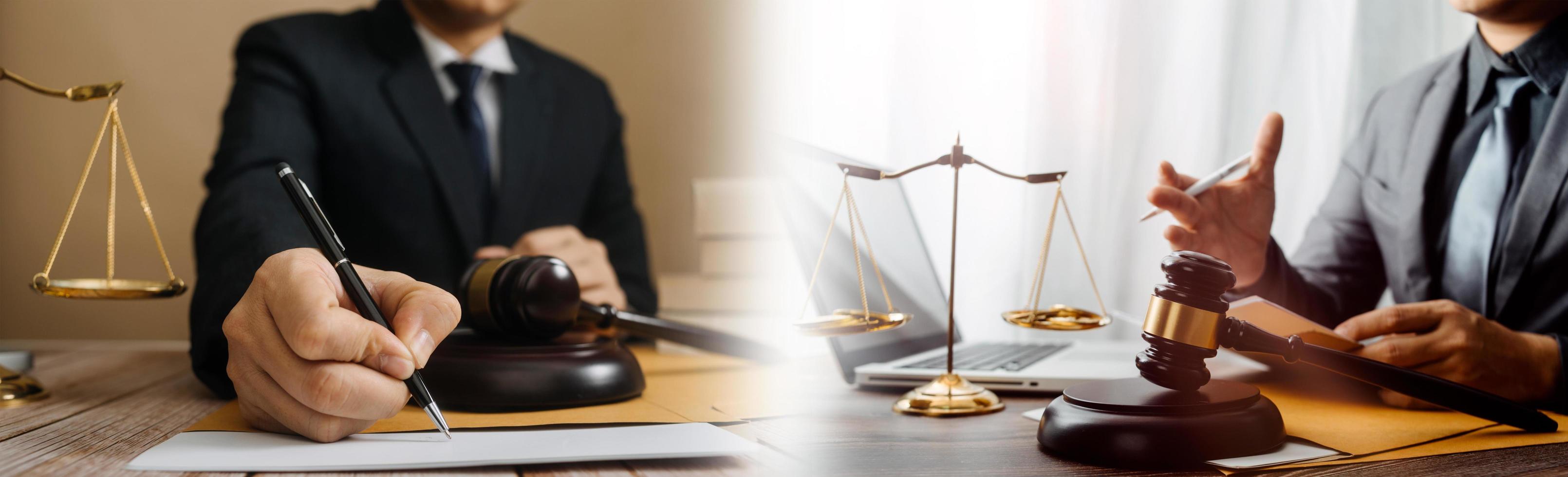 Justice and law concept.Male judge in a courtroom with the gavel, working with, computer and docking keyboard, eyeglasses, on table in morning light photo