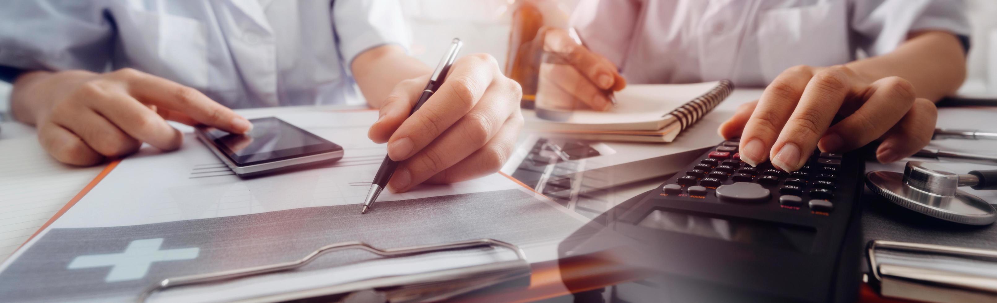Medicine doctor hand working on a patients x-ray scans digital healthcare and connection with modern virtual screen interface icons, Medical technology and network concept. photo