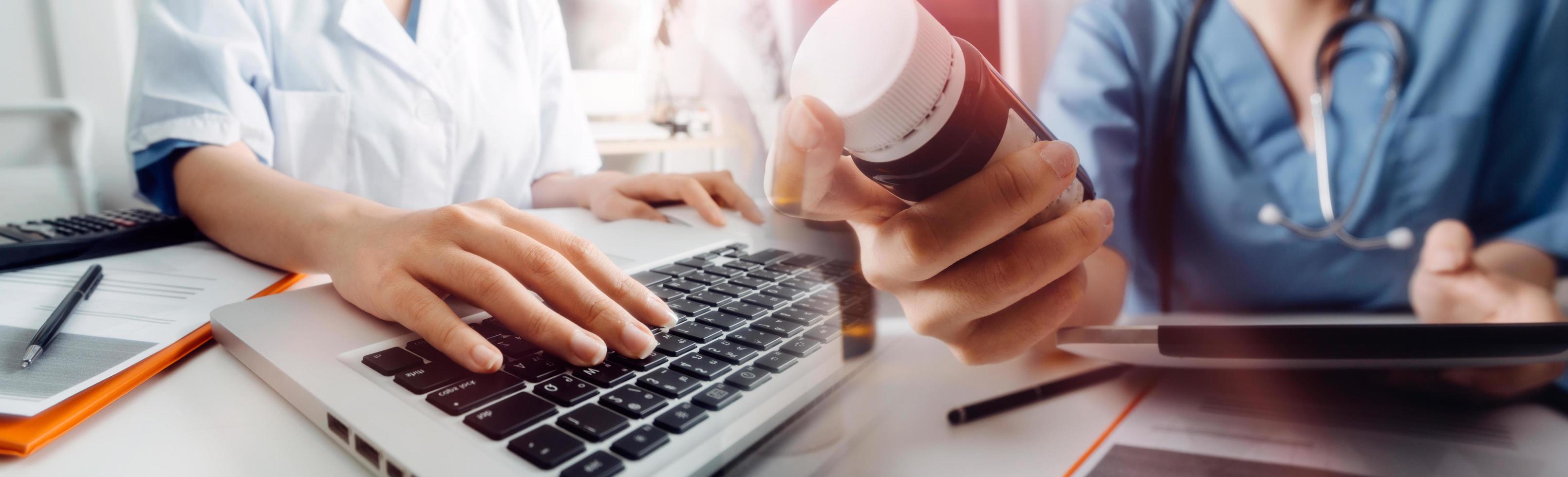 Medicine doctor hand working on a patients x-ray scans digital healthcare and connection with modern virtual screen interface icons, Medical technology and network concept. photo