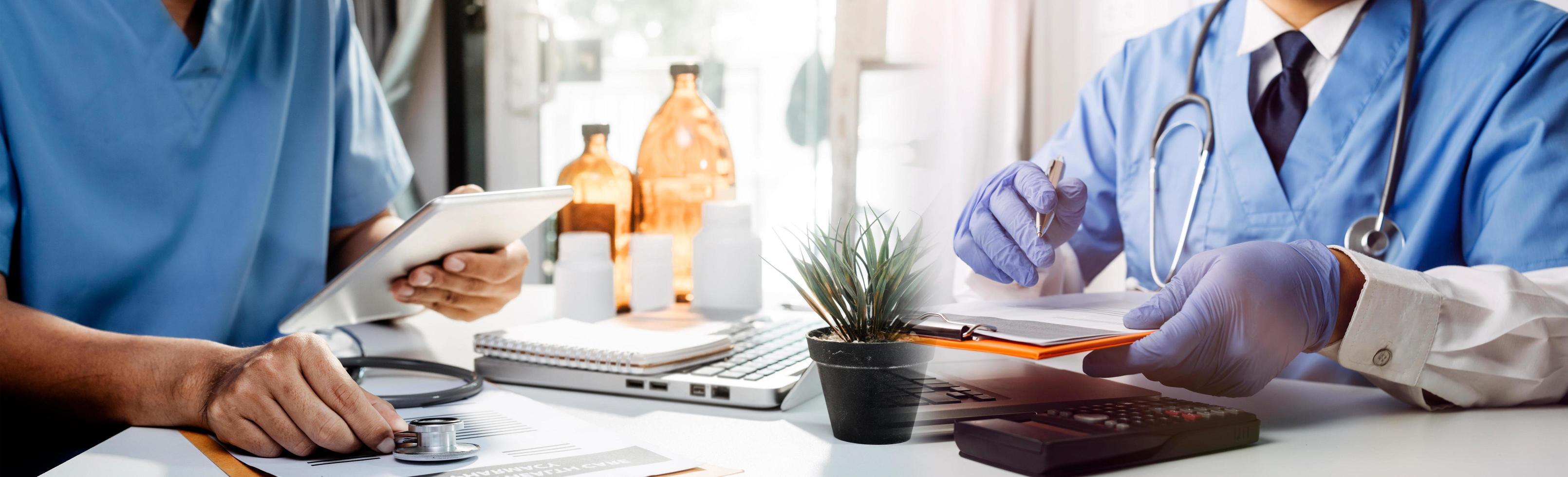 Medicine doctor hand working on a patients x-ray scans digital healthcare and connection with modern virtual screen interface icons, Medical technology and network concept. photo