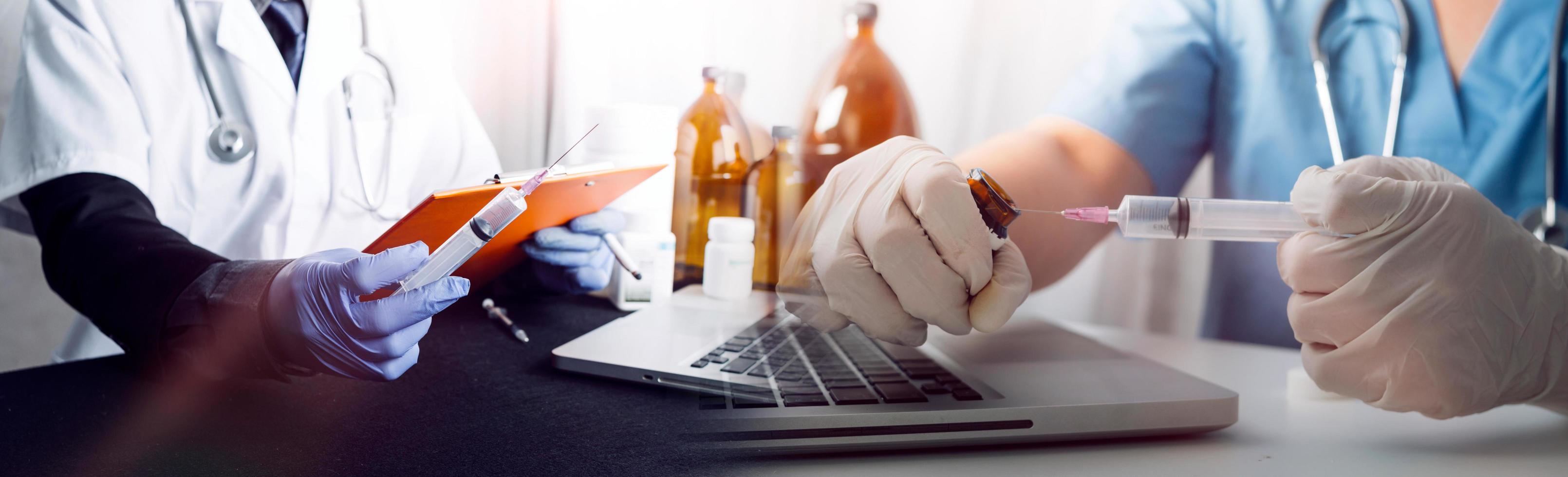 Medicine doctor hand working on a patients x-ray scans digital healthcare and connection with modern virtual screen interface icons, Medical technology and network concept. photo