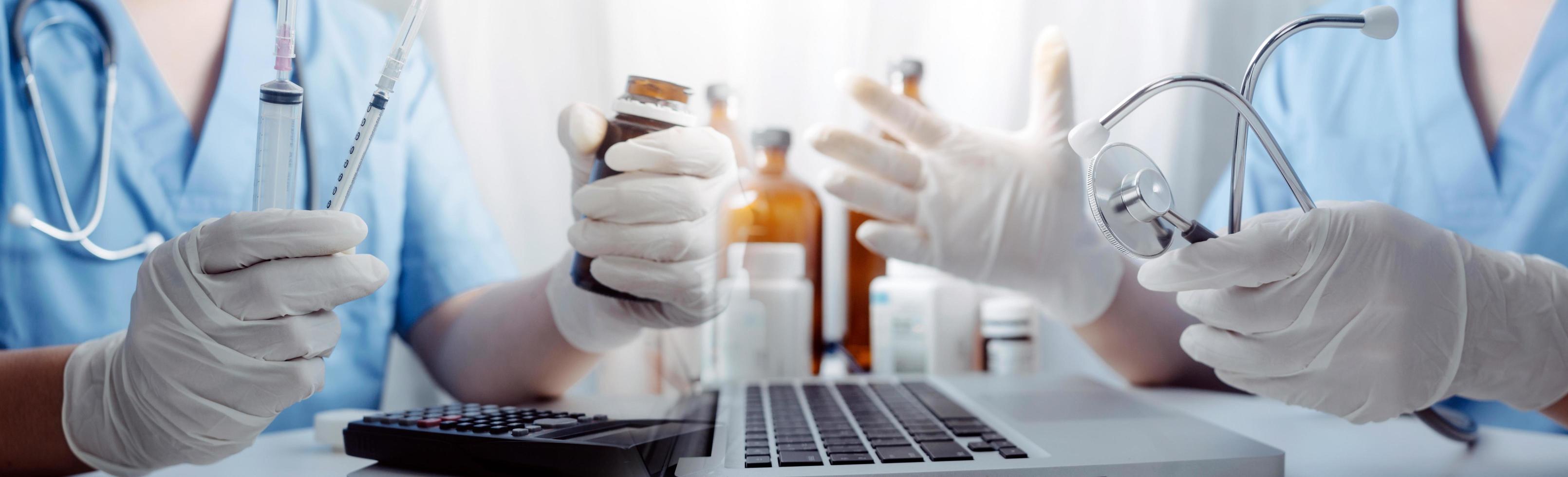 Medicine doctor hand working on a patients x-ray scans digital healthcare and connection with modern virtual screen interface icons, Medical technology and network concept. photo