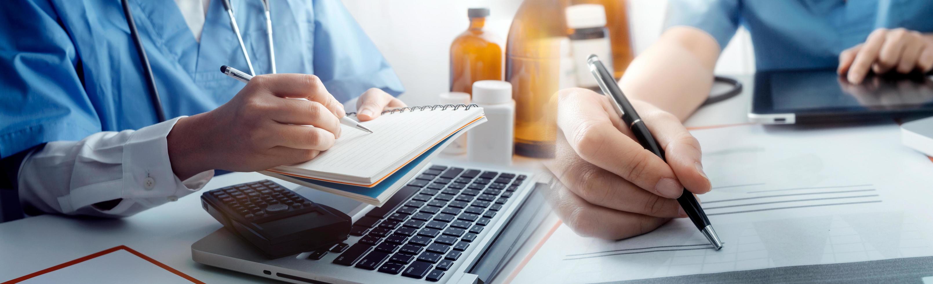 Medicine doctor hand working on a patients x-ray scans digital healthcare and connection with modern virtual screen interface icons, Medical technology and network concept. photo