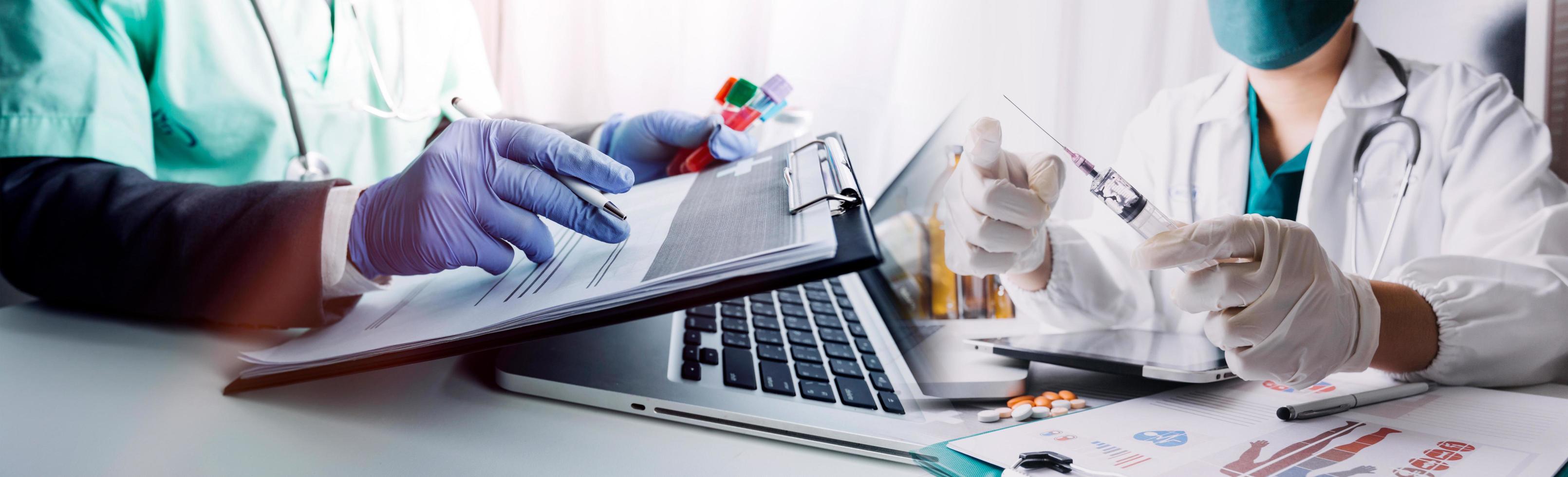 Medicine doctor hand working on a patients x-ray scans digital healthcare and connection with modern virtual screen interface icons, Medical technology and network concept. photo