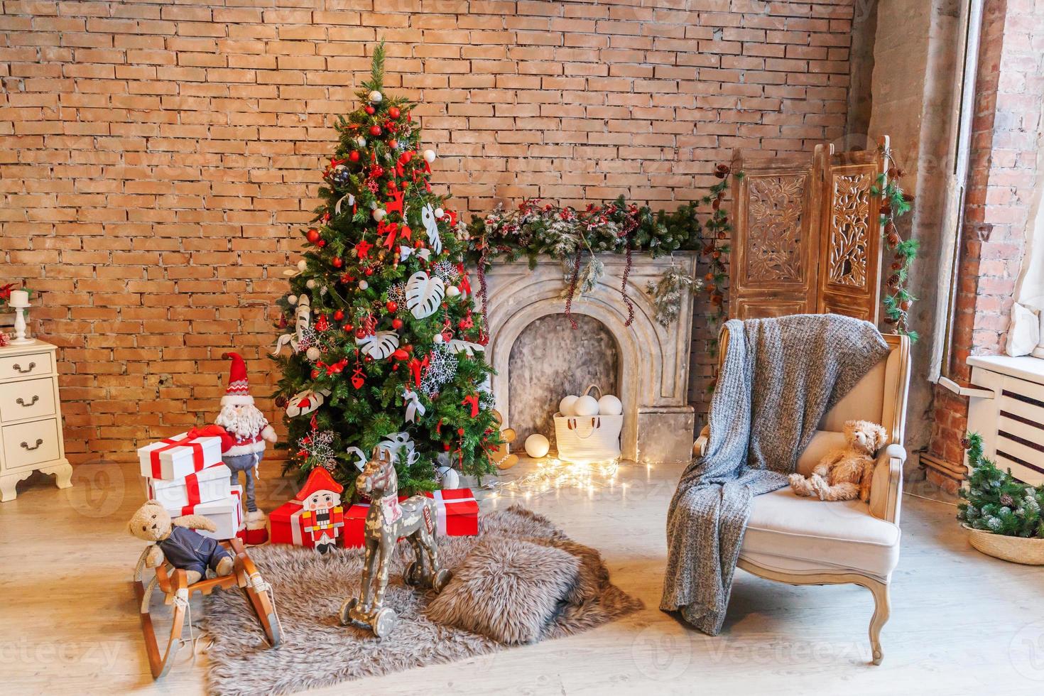 Classic christmas New Year decorated interior room New year tree and fireplace photo