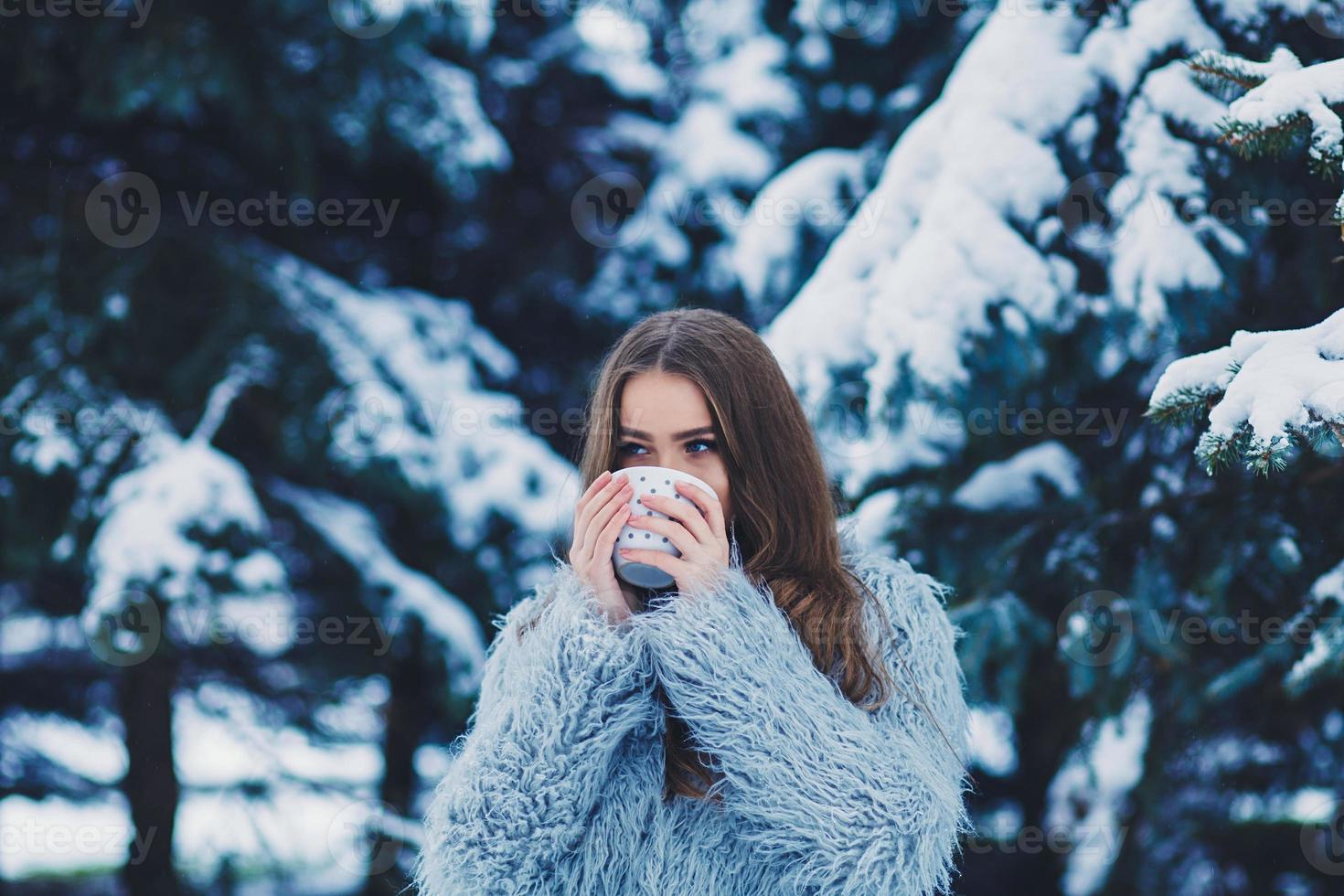 Woman with mug of tea photo