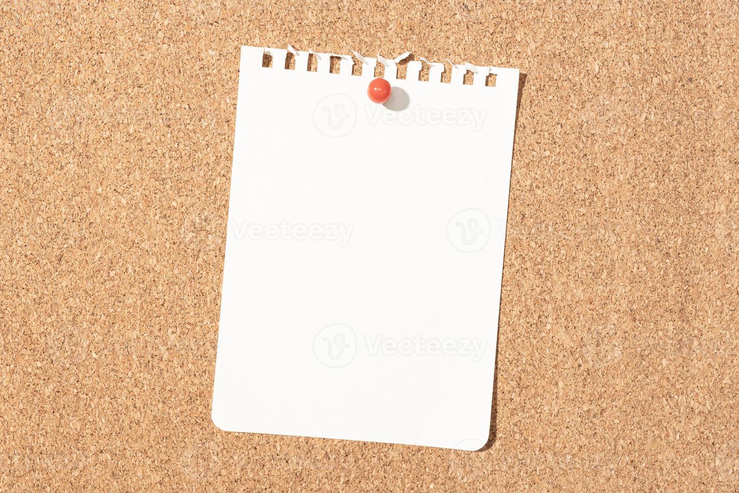 Blank notebook paper sheet pinned on cork board. Template Mock up photo