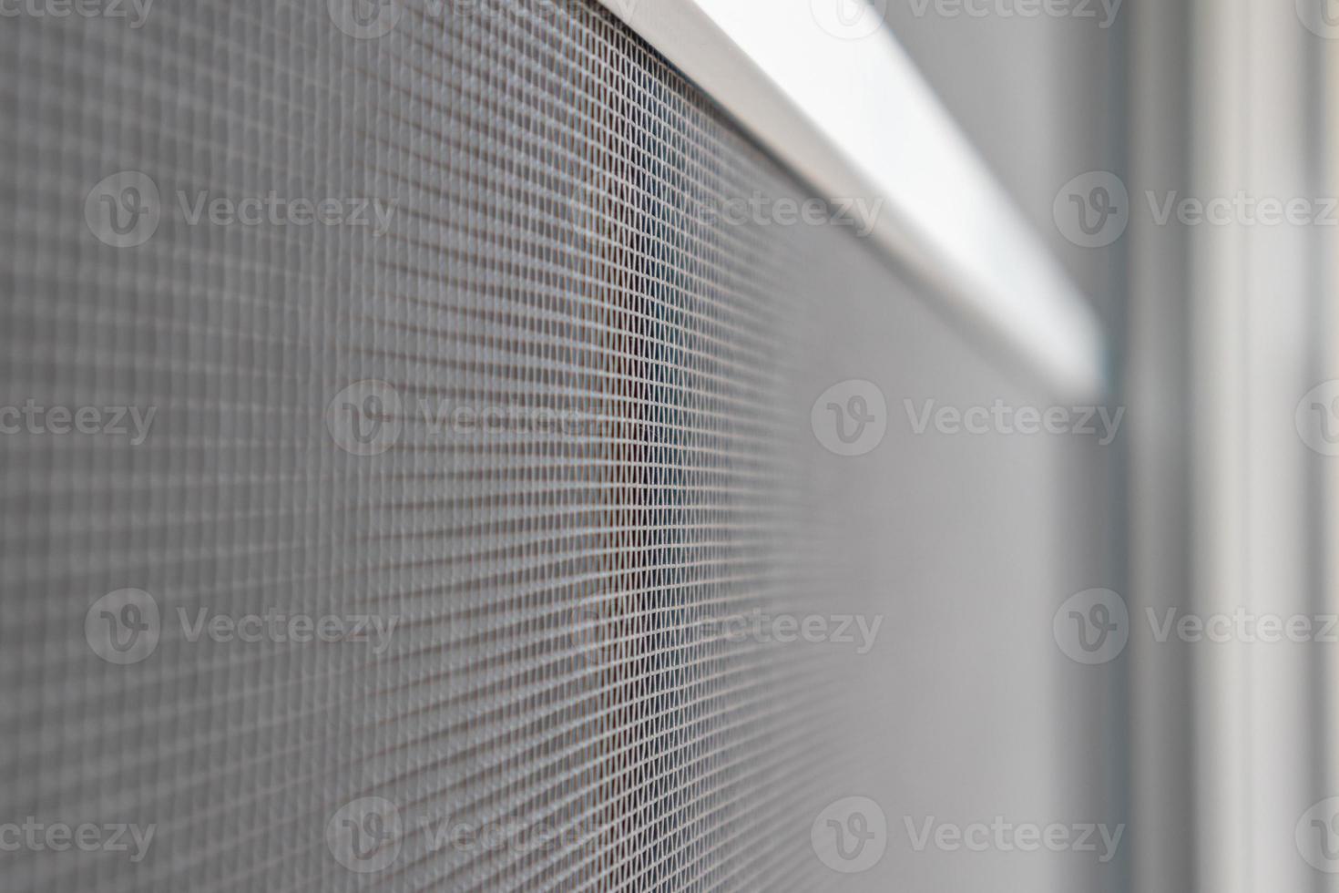 mosquito net wire screen on house window protection against insect photo