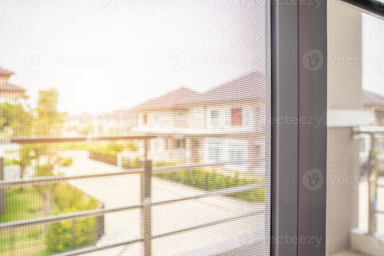 mosquito net wire screen on house window protection against insect photo