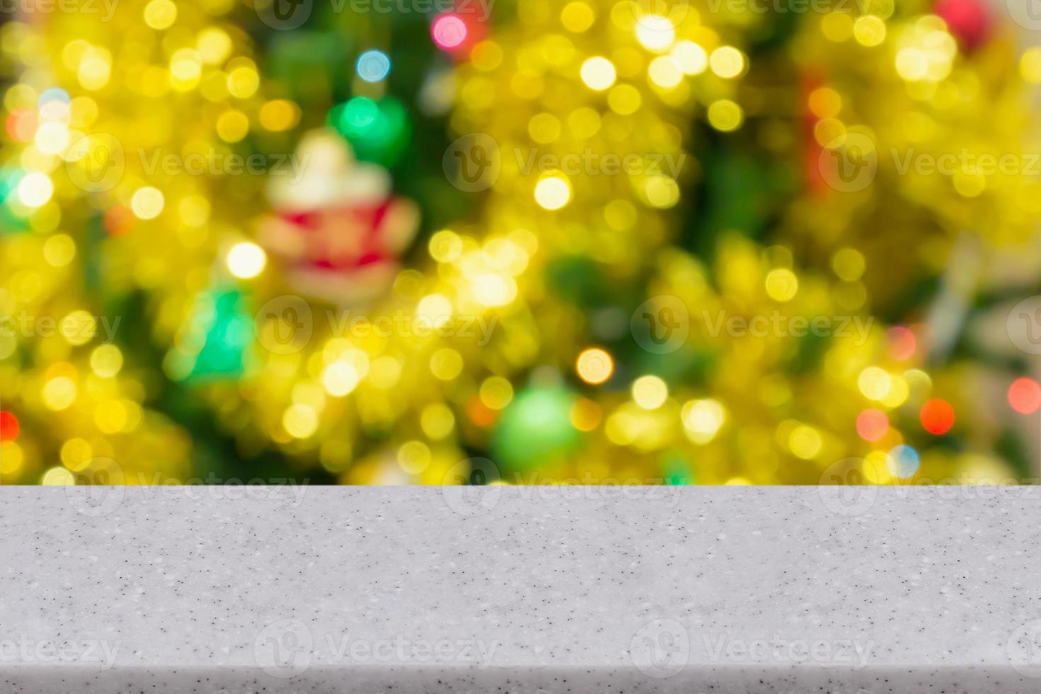 Christmas tree decorated with lights abstract blur background with bokeh photo