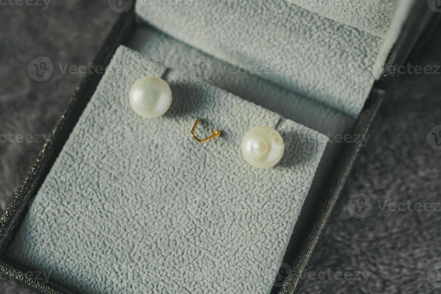 pearl earring in jewelry box photo