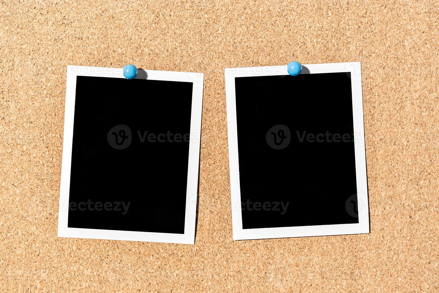Two Blank Vintage instant photo frame pinned on corkboard. Template