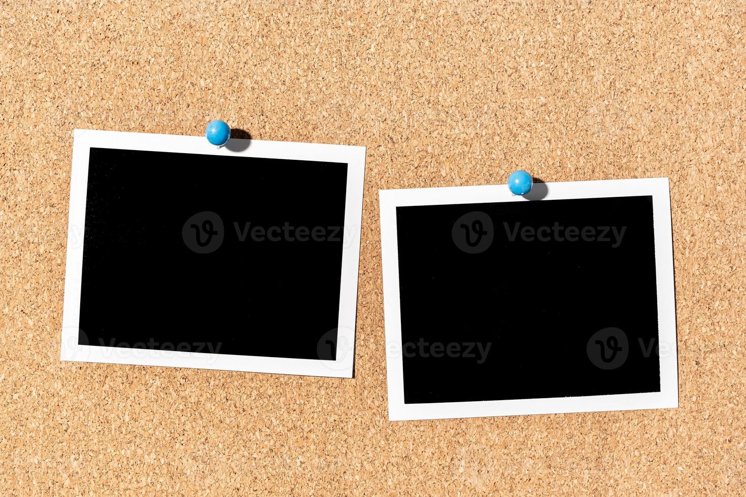 Two Blank Vintage instant photo frame pinned on corkboard. Template