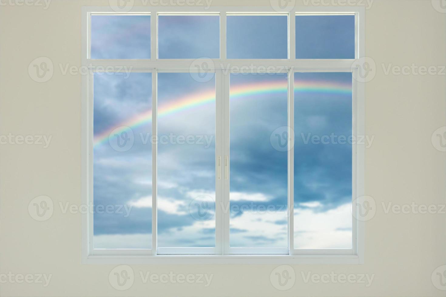 Modern house window view with rainbow background photo