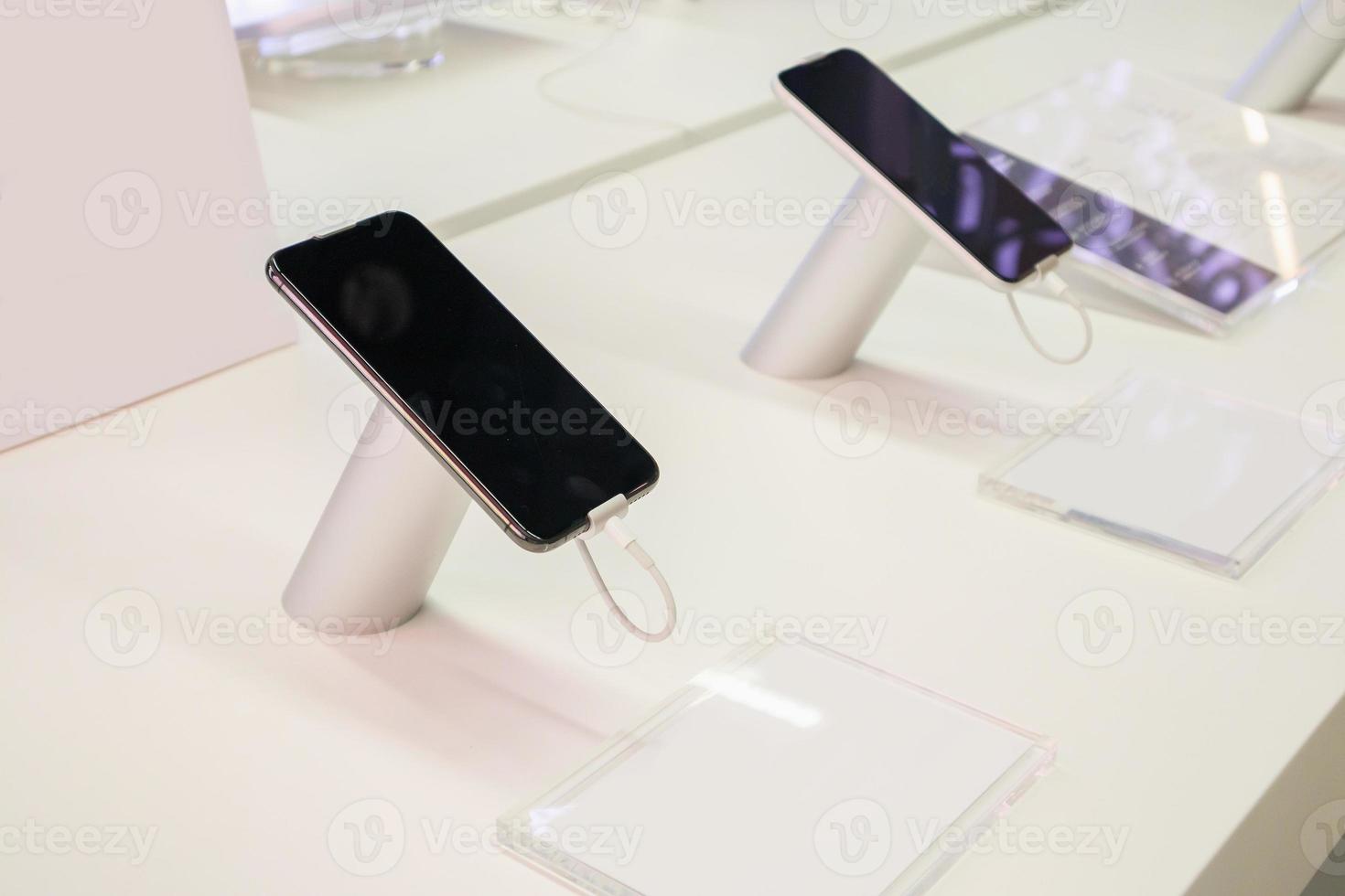mobile smartphone showcase in electronic store photo