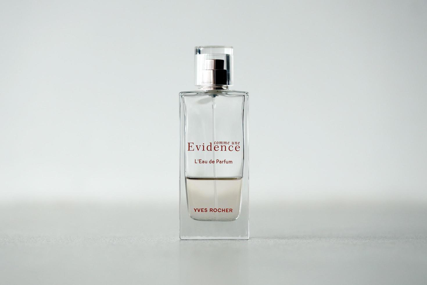 TERNOPIL, UKRAINE - SEPTEMBER 2, 2022 Yves Rocher Comme Une Evidence perfume bottle on monochrome background photo