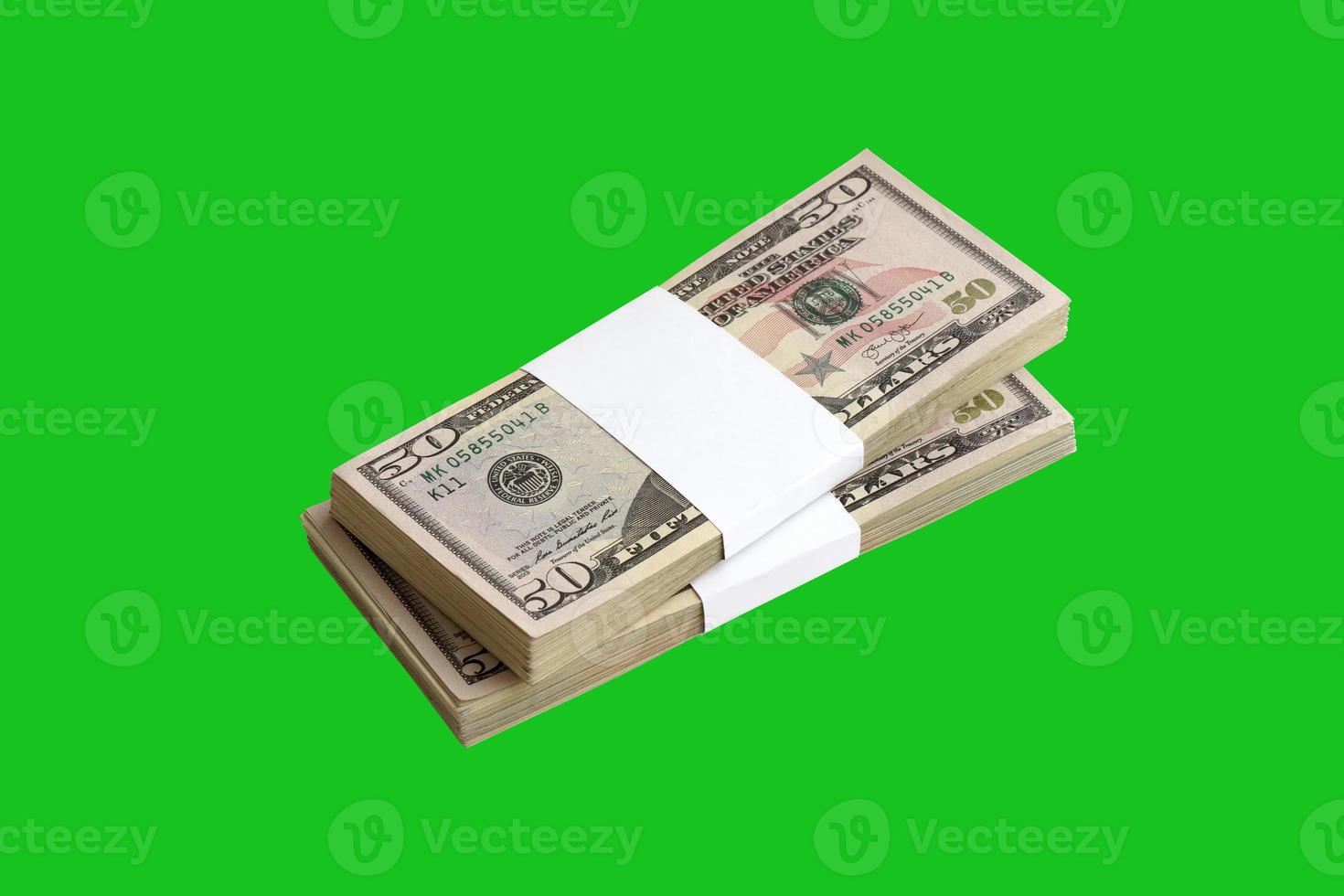 Bundle of US dollar bills isolated on chroma keyer green. Pack of american money with high resolution on perfect green mask photo