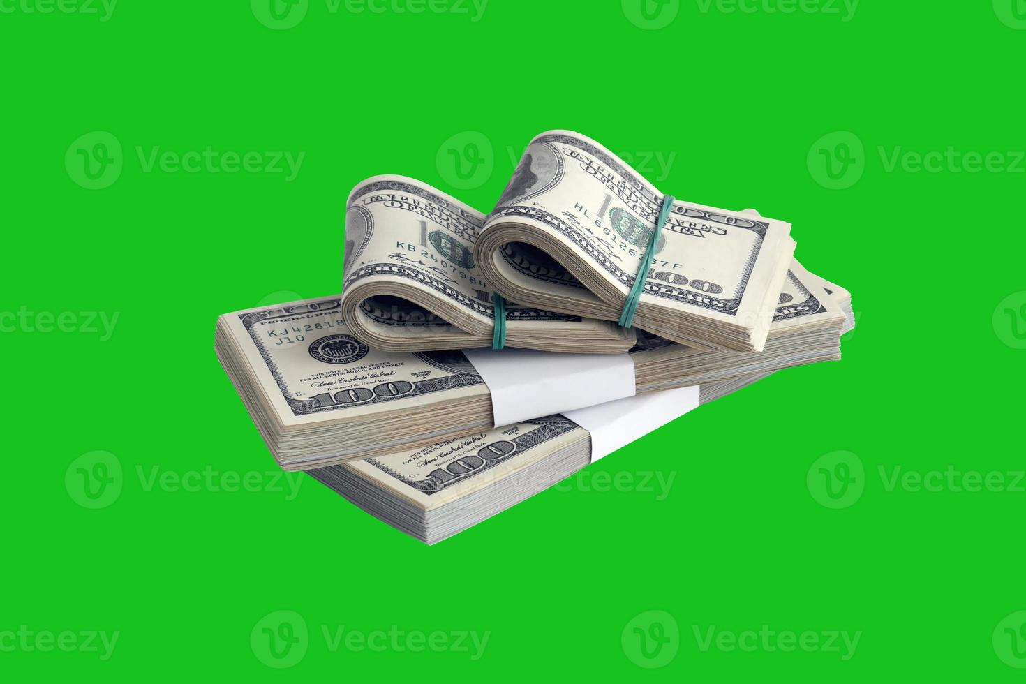 Bundle of US dollar bills isolated on chroma keyer green. Pack of american money with high resolution on perfect green mask photo