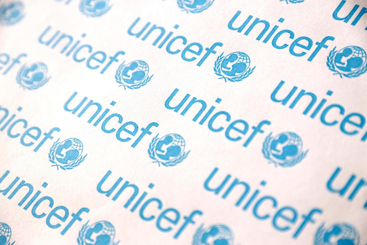 TERNOPIL, UKRAINE - MAY 2, 2022 Unicef logo on paper. Unicef is a United Nations programm that provides humanitarian and developmental assistance to children and mothers photo