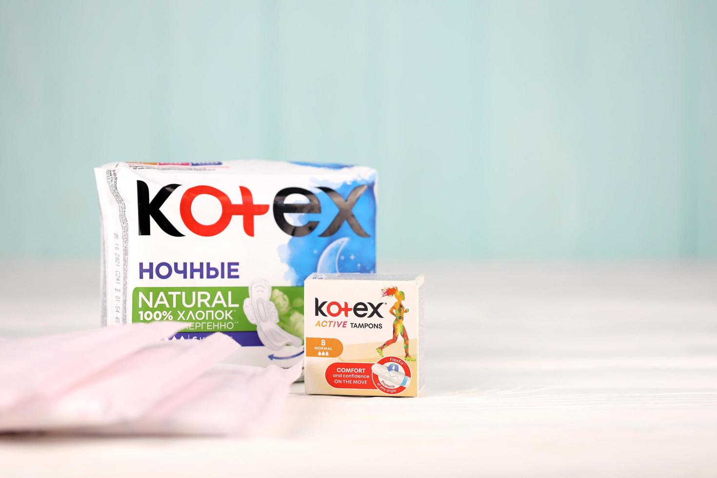 KHARKIV, UKRAINE - DECEMBER 16, 2021 Kotex production with logo. Kotex is a brand of feminine hygiene products, includes maxi, thin and ultra thin pads. photo