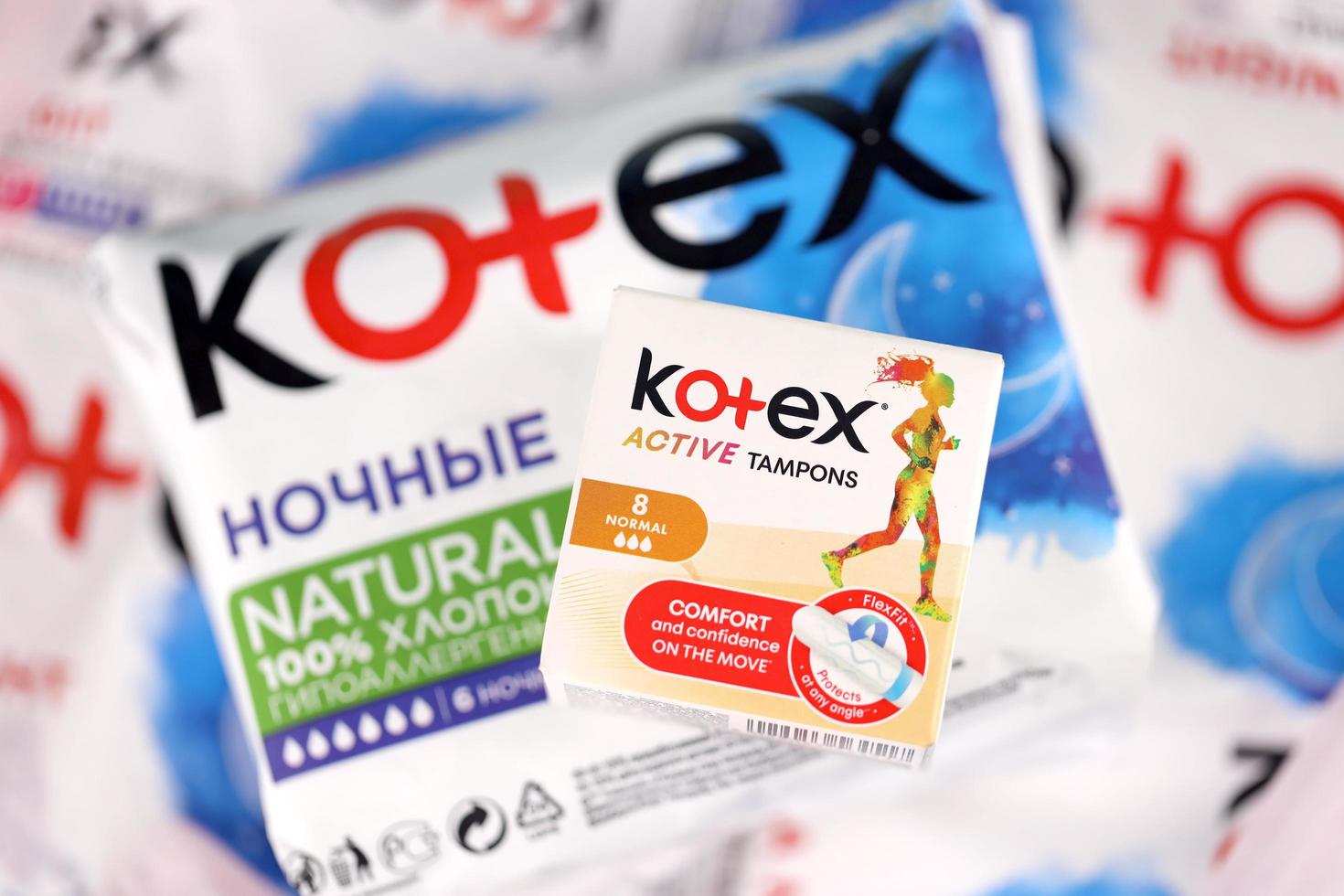 KHARKIV, UKRAINE - DECEMBER 16, 2021 Kotex production with logo. Kotex is a brand of feminine hygiene products, includes maxi, thin and ultra thin pads. photo