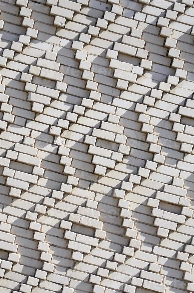 A pattern made of white bricks in the form of diamond shapes. Decoration of the walls during the Soviet Union photo