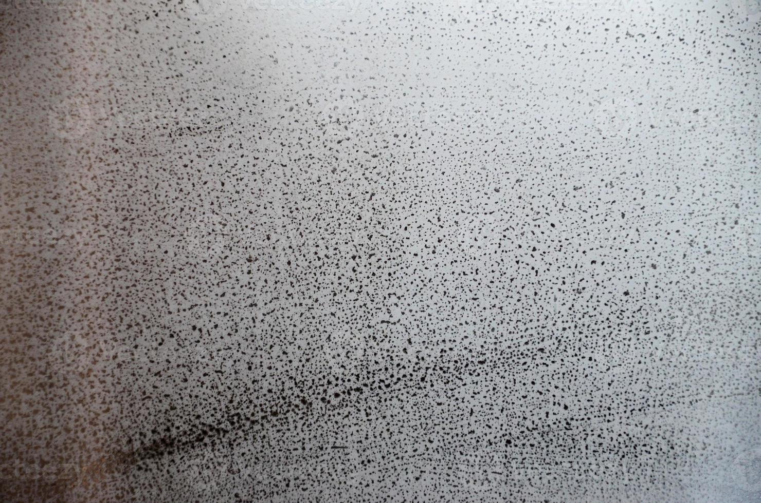 Window glass with condensate or steam after heavy rain, Texture or background image photo