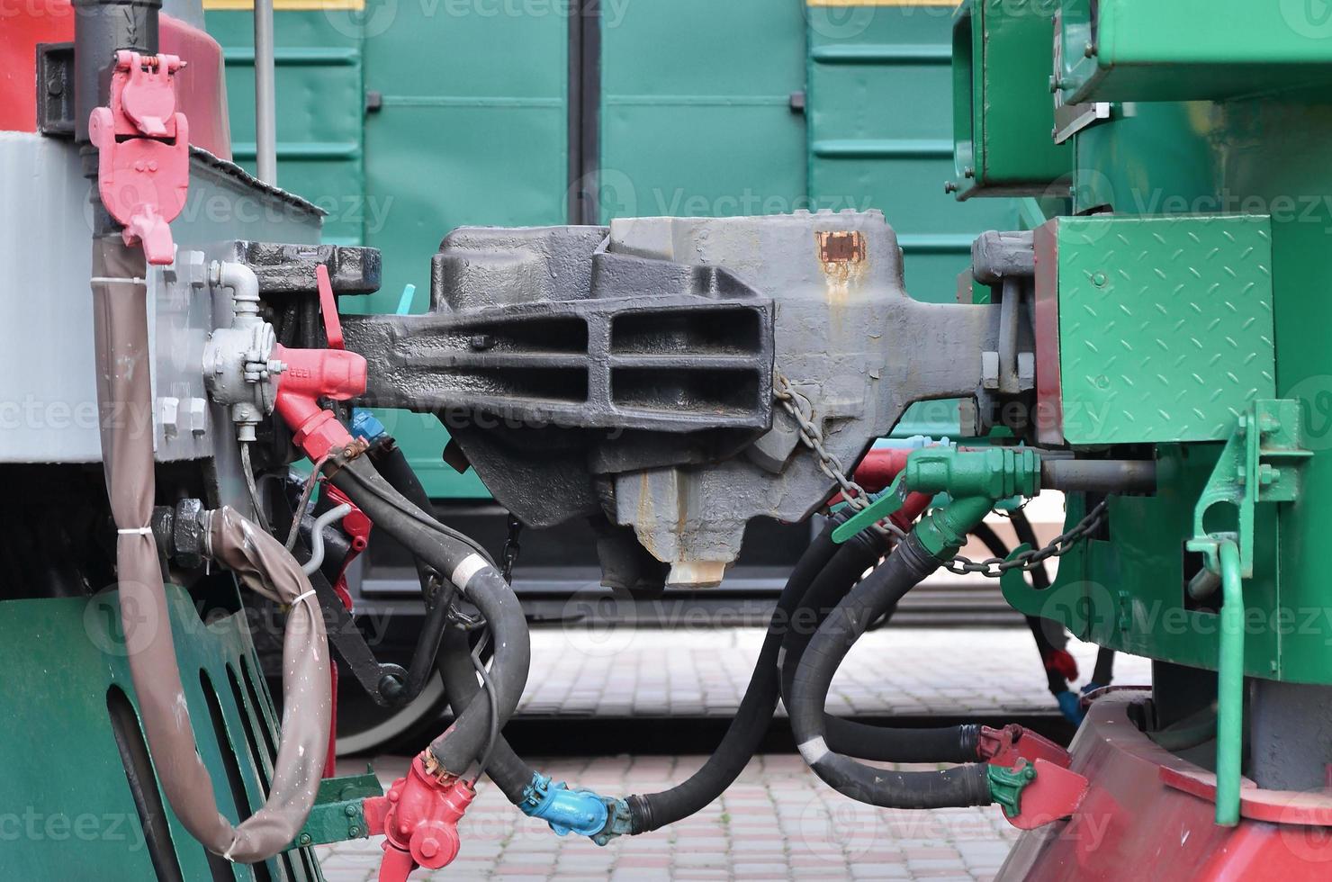 Wagon coupling. The coupler of two railway trains or freight wagons with railway sleeves photo