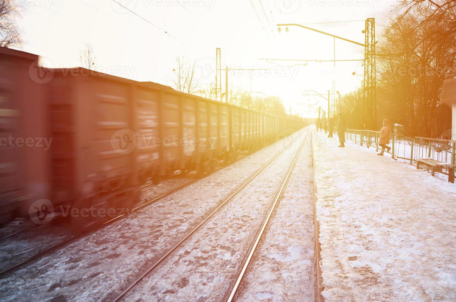 Evening winter landscape with the railway station photo