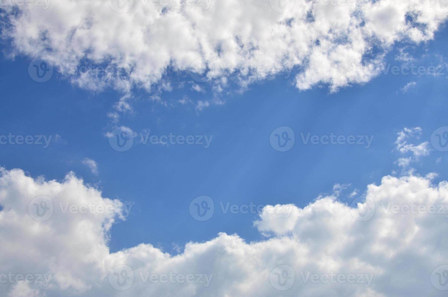 Beautiful blue sky background template with some space for input text message below isolated on blue photo