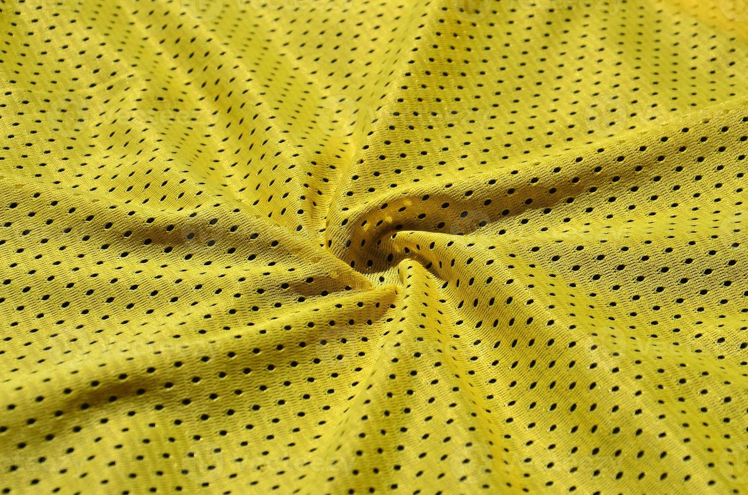 Texture of sportswear made of polyester fiber. Outerwear for sports training has a mesh texture of stretchable nylon fabric photo