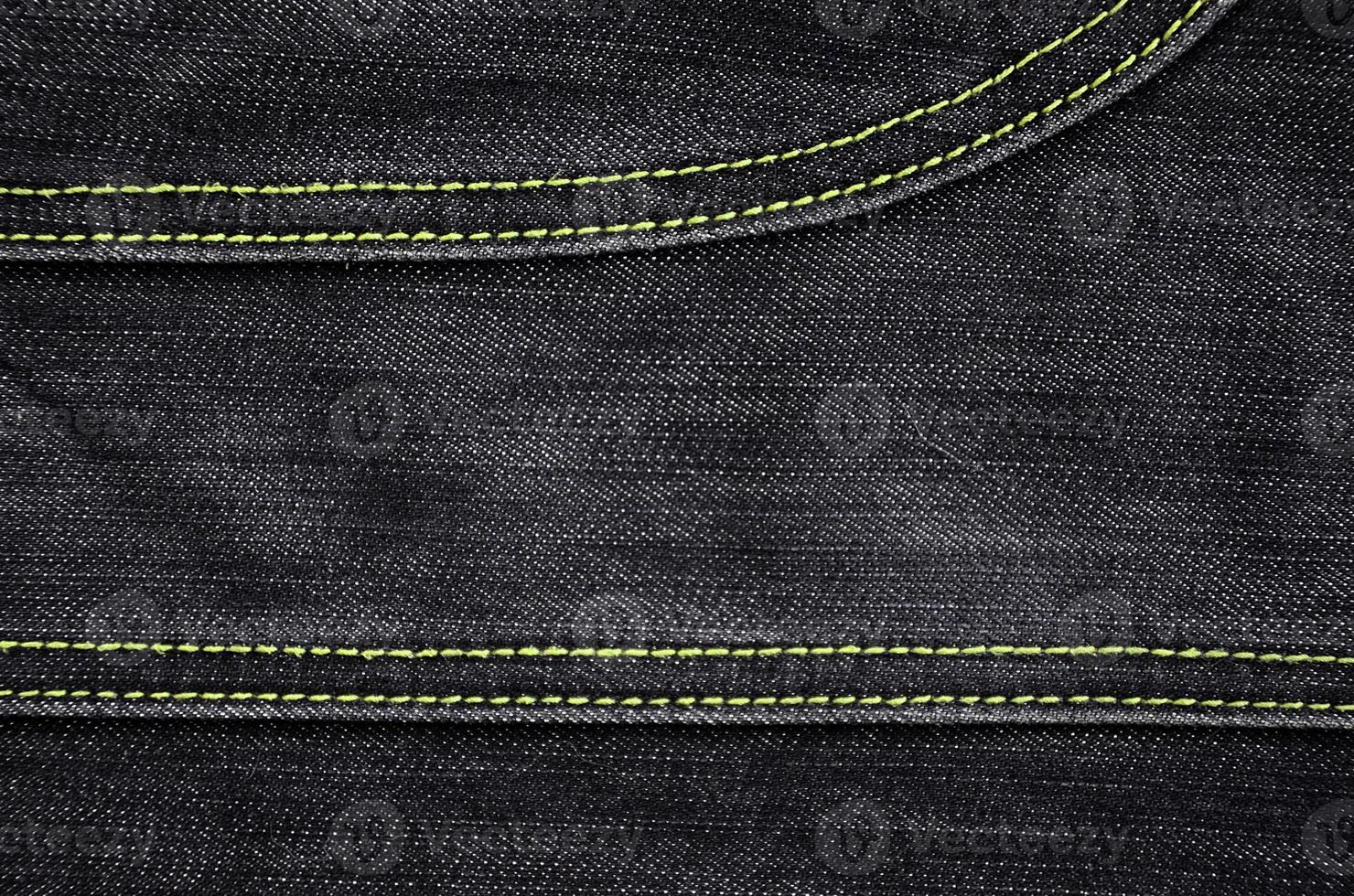 The texture of black denim cloth photo